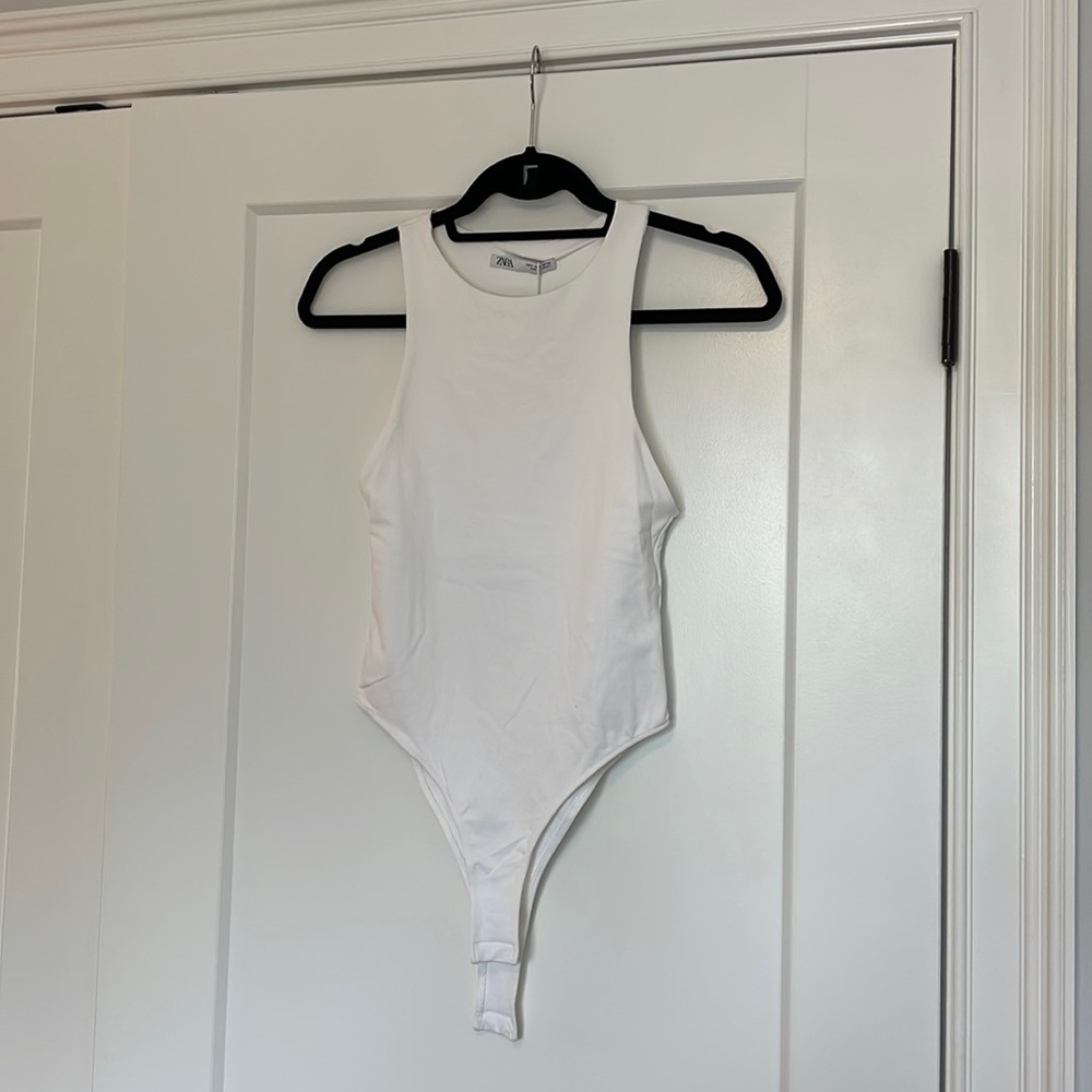 White bodysuit from Zara, no sleeves